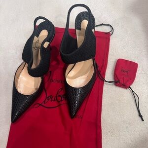 Christian Louboutin black pumps in size 8 1/2.